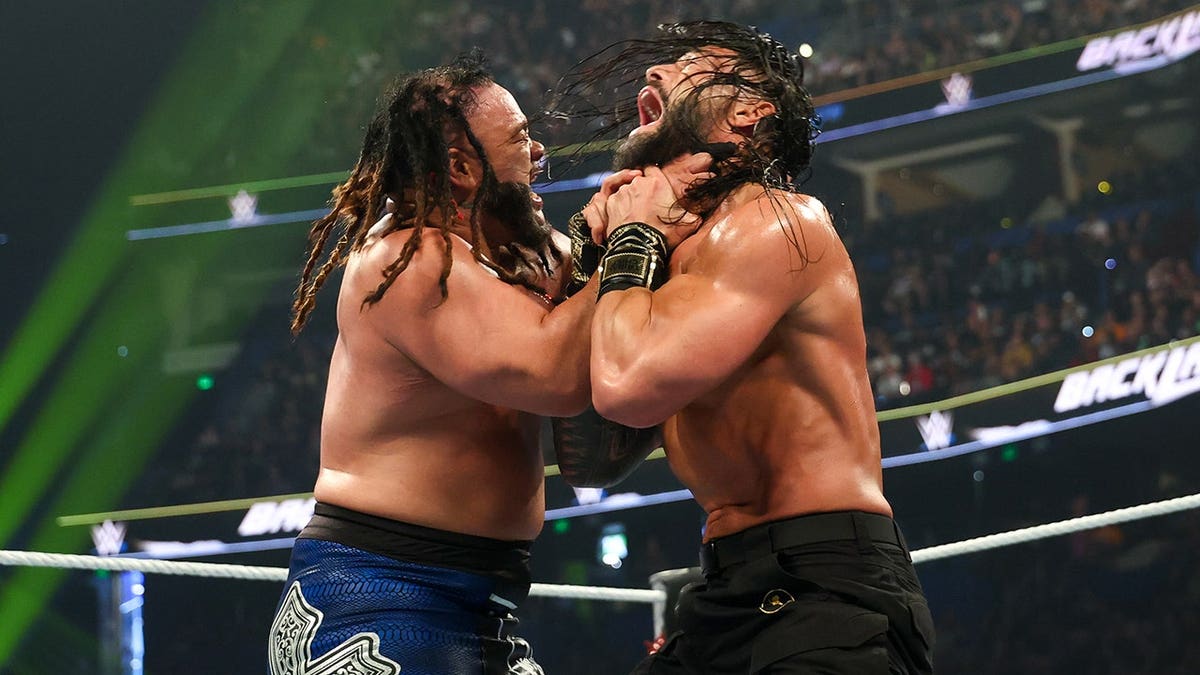 Jacob Fatu wrestling Roman Reigns successful  WWE Backlash match