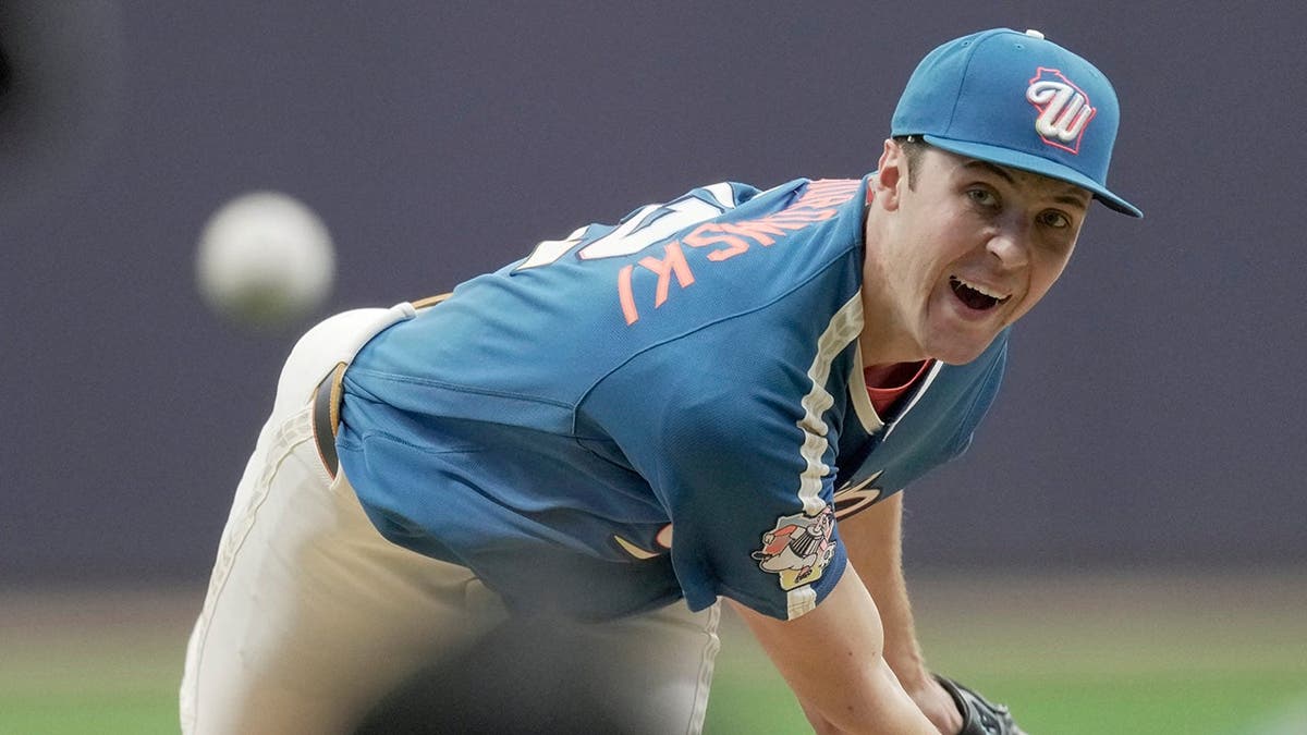 Milwaukee Brewers pitcher Jacob Misiorowski throwing a transportation   during a game.