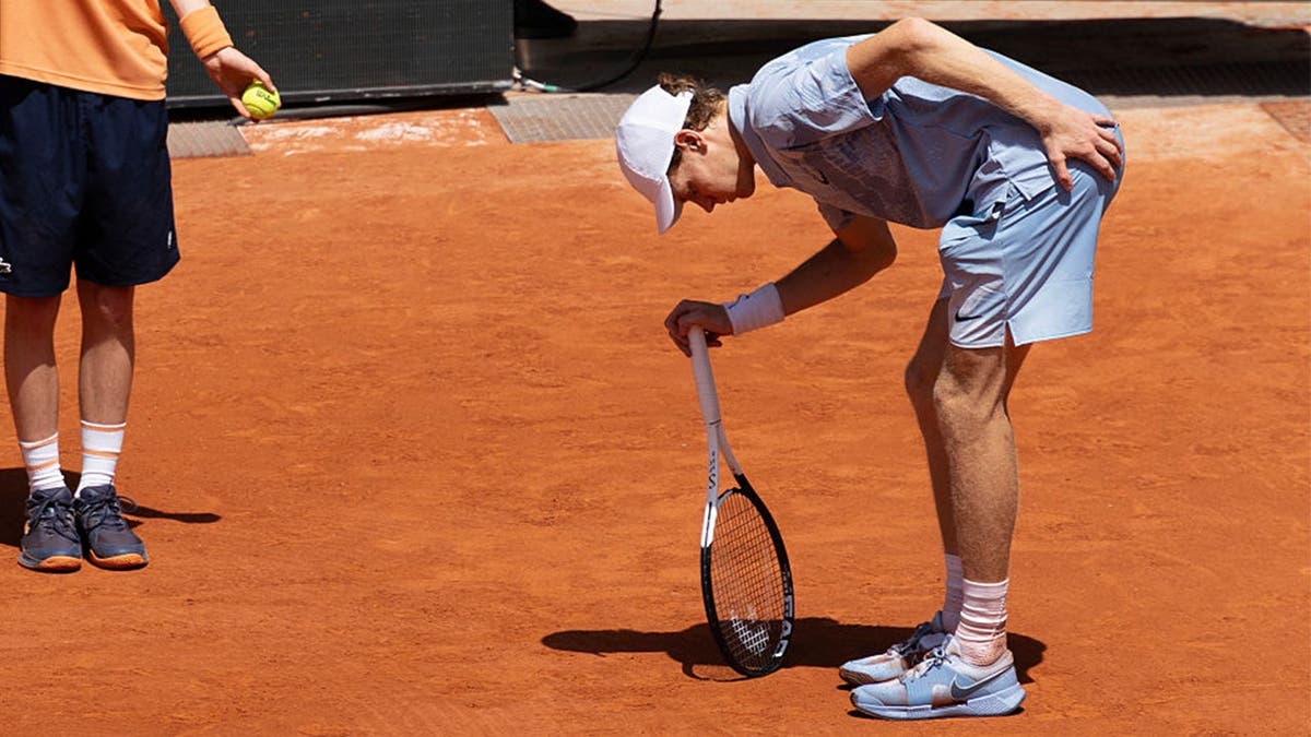 Jannik Sinner of Italy successful  pain