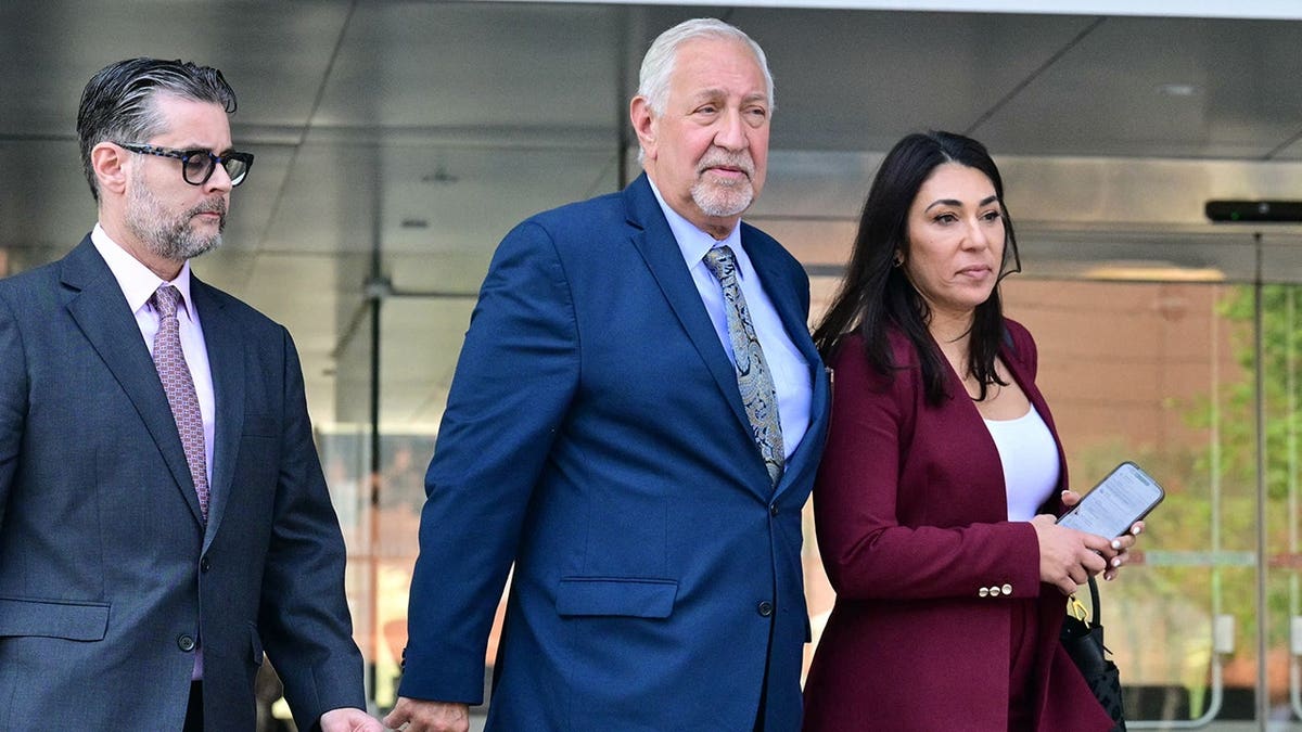 Attorneys Mark Geragos and Alexandra Kazarian walking outside First Street Courthouse in Los Angeles