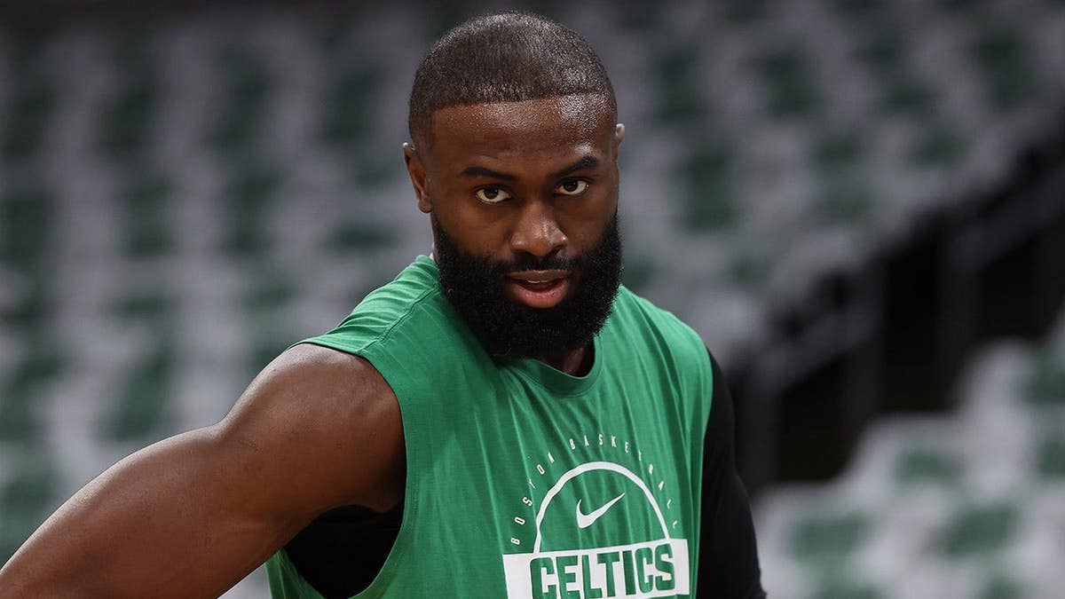 Boston Celtics guard Jaylen Brown standing on the basketball court.