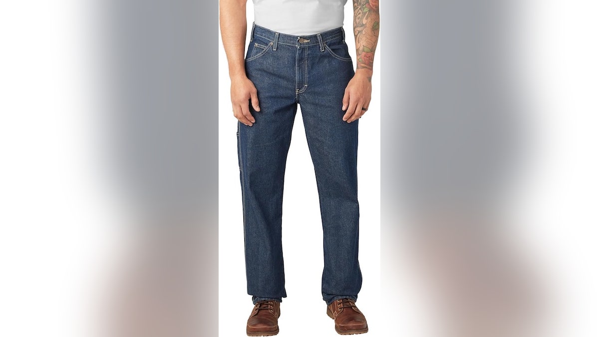 Carpenter jeans fit loosely for room to move.