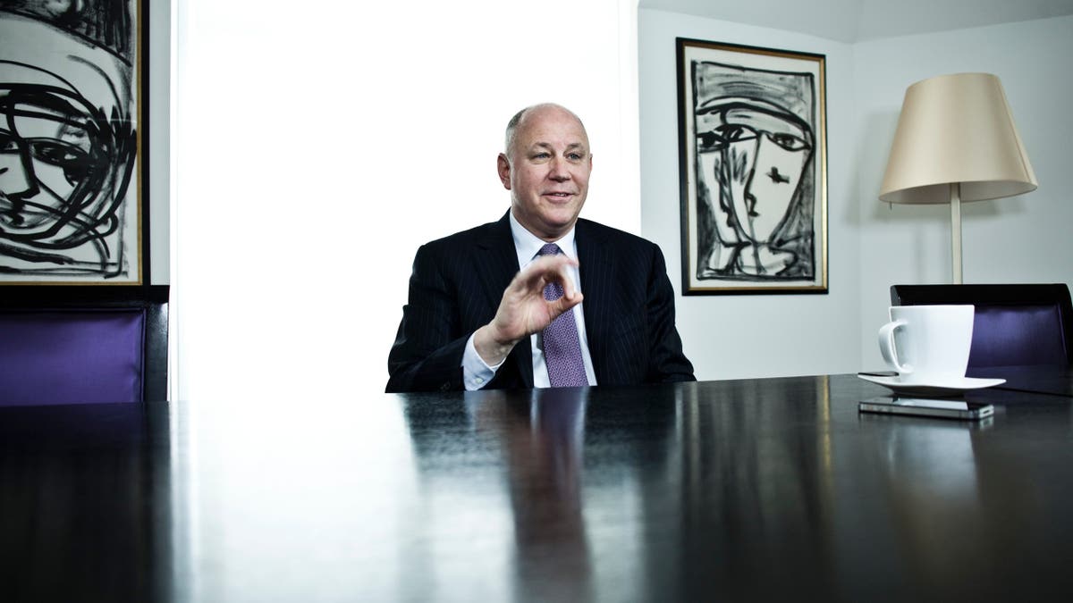 Jeffrey Sprecher standing and posing in Paris