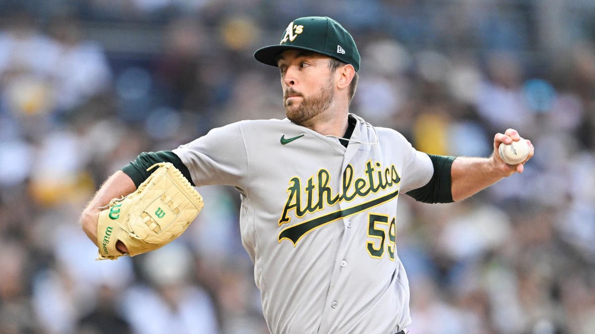 Athletics pitcher Jeffrey Springs pitching during a baseball game at Petco Park