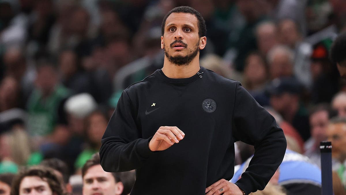 Head coach Joe Mazzulla of the Boston Celtics watching during NBA playoff game at TD Garden