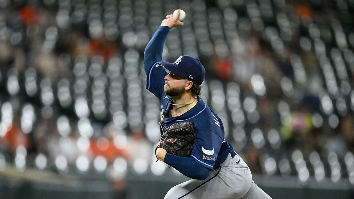 Tampa Bay Rays relief pitcher Jonathan Heasley throwing a pitch during a baseball game.