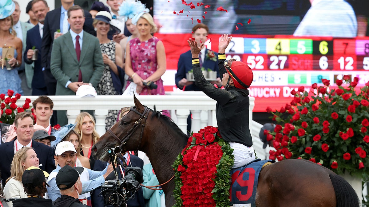 Jockey Jose Ortiz of Golden Tempo celebrates 