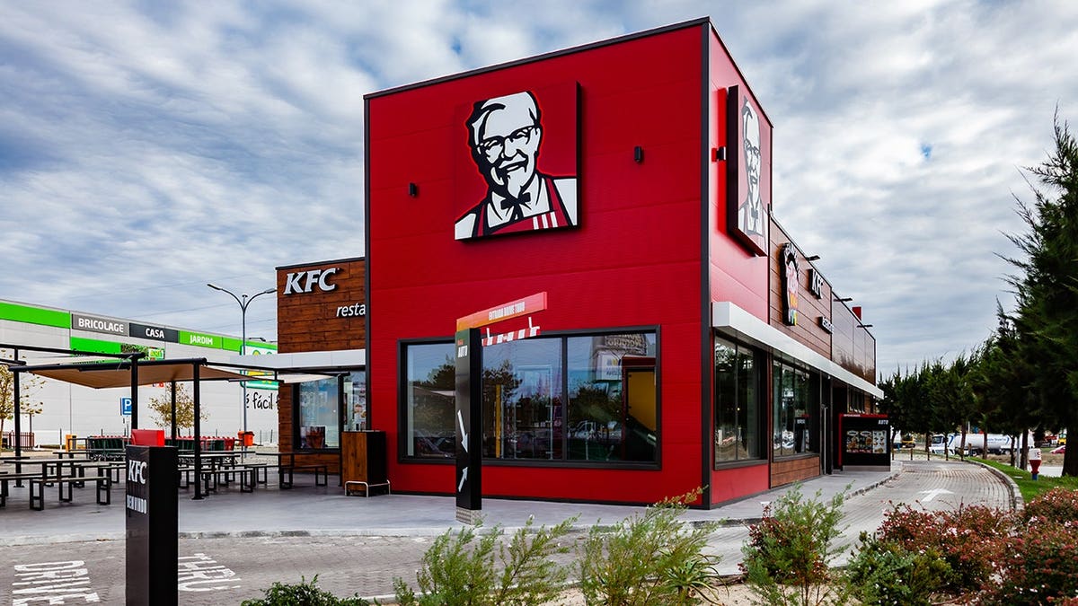 KFC fast food restaurant with outdoor seating and drive thru in Barreiro, Portugal
