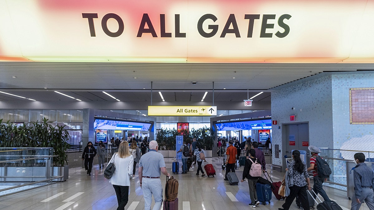 People walking in LaGuardia.