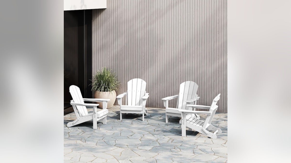 Each chair in this set of four folds up for convenient storage.