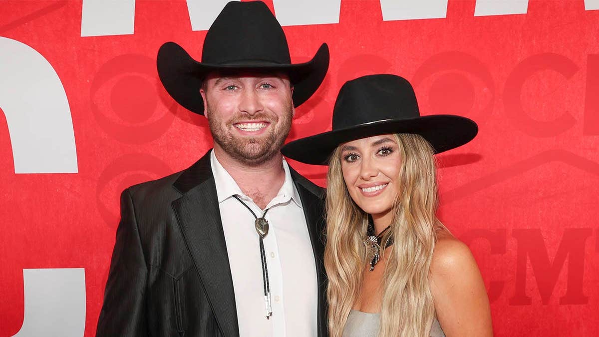 Duck Hodges and Lainey Wilson posing together at the 2024 CMT Music Awards in Austin, Texas