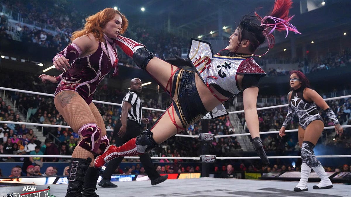 Hikaru Shida standing in a wrestling ring at AEW Double or Nothing event in Queens, New York