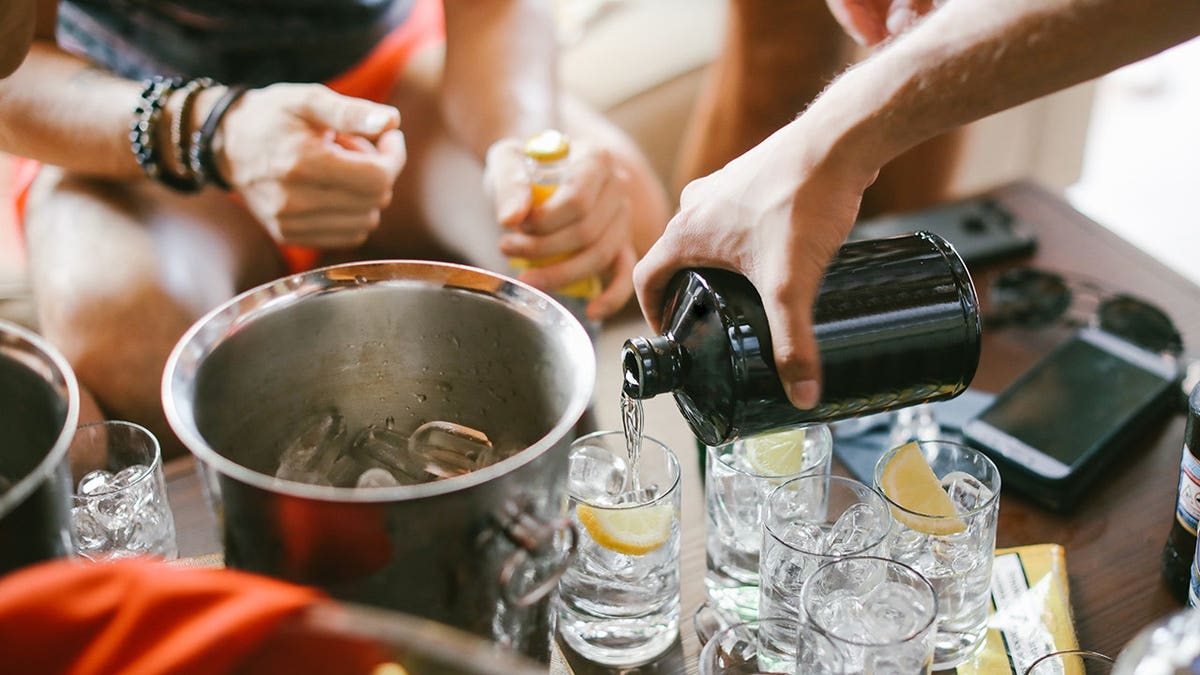 Liquor shots arranged on ice in a party setting