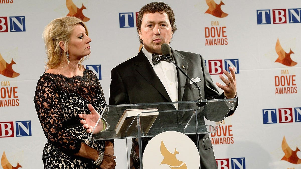 Lisa Robertson and Al Robertson standing backstage at the 45th Annual GMA Dove Awards