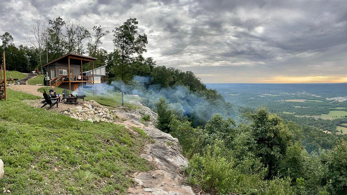 A tiny home rental sits on a clifftop in Rising Fawn, Georgia