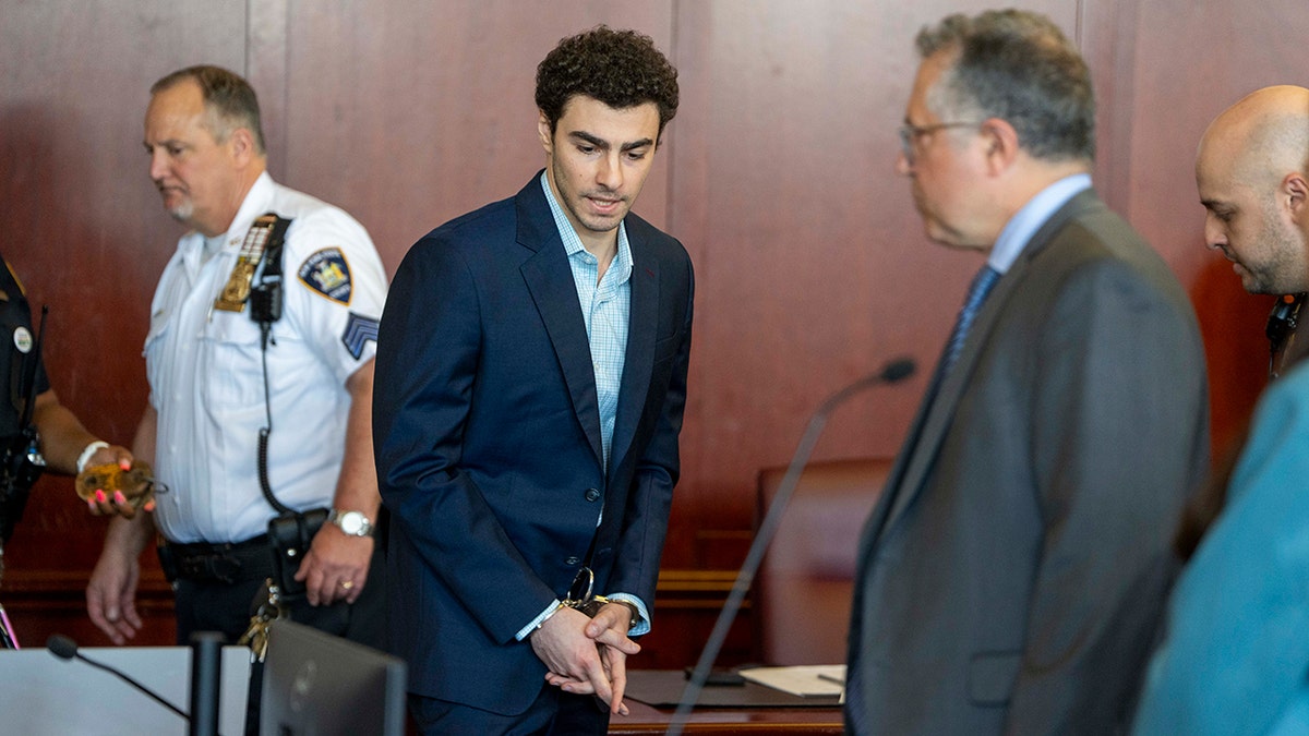 Luigi Mangione seated successful  courtroom during grounds  suppression hearing