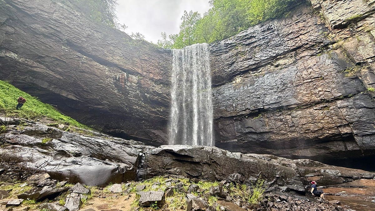 scenic 120-foot waterfall seen from the base of the falls