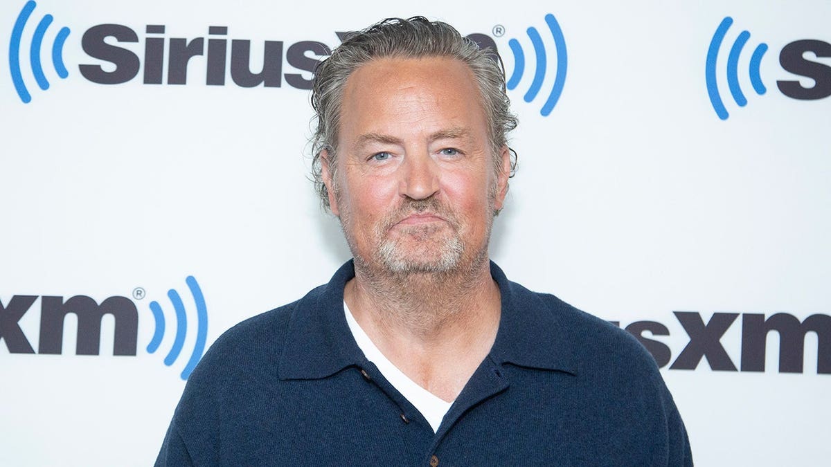 Matthew Perry standing inside SiriusXM Studios in New York City