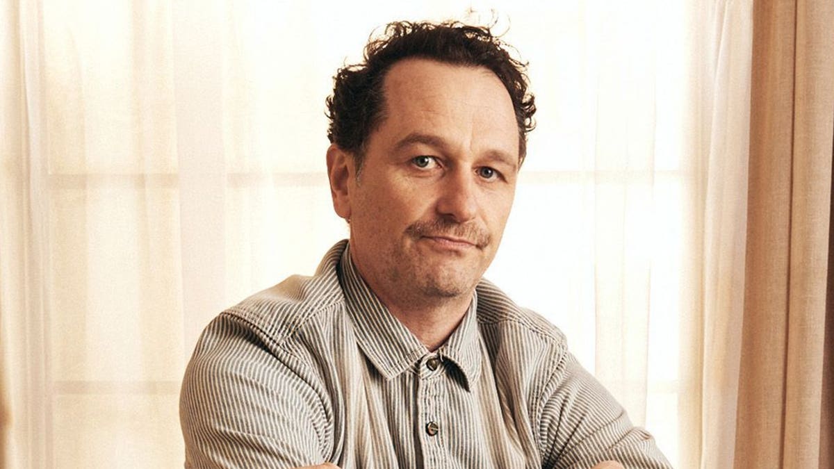 Matthew Rhys posing in a portrait studio at SXSW in Austin, Texas