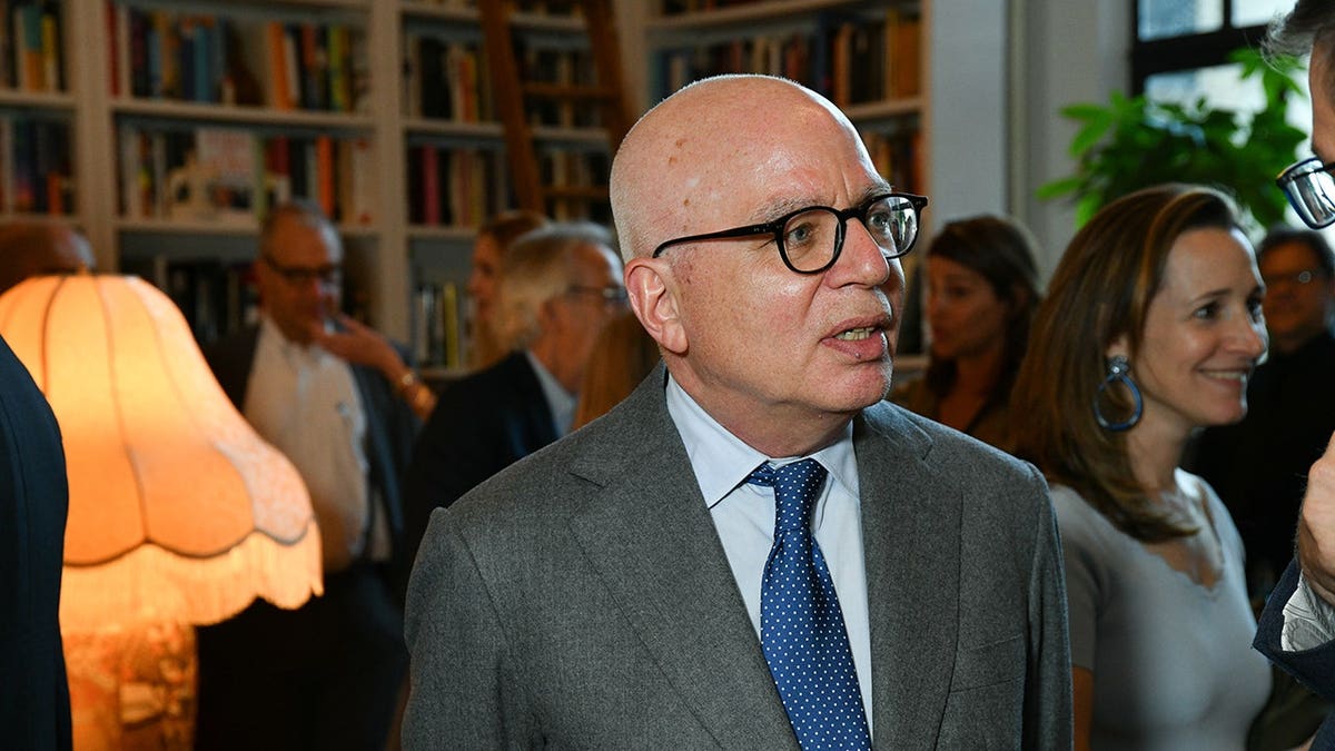 Michael Wolff standing at a book launch event in New York City