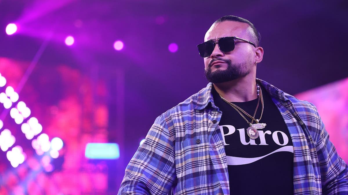 Mike Santana standing in the wrestling ring at WWE Performance Center
