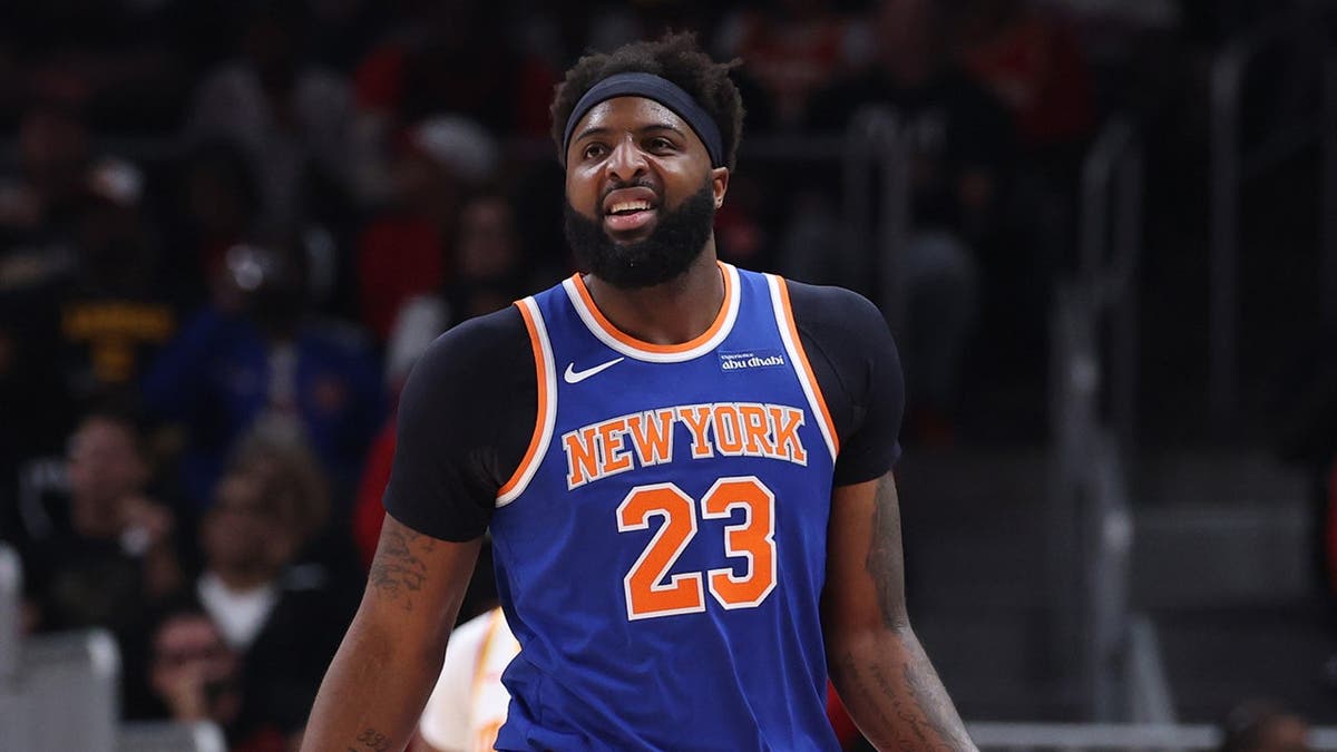 Mitchell Robinson of the New York Knicks reacting during a basketball game at State Farm Arena