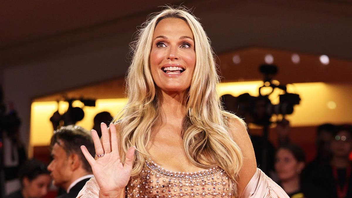 Molly Sims posing on the red carpet at the Venice International Film Festival