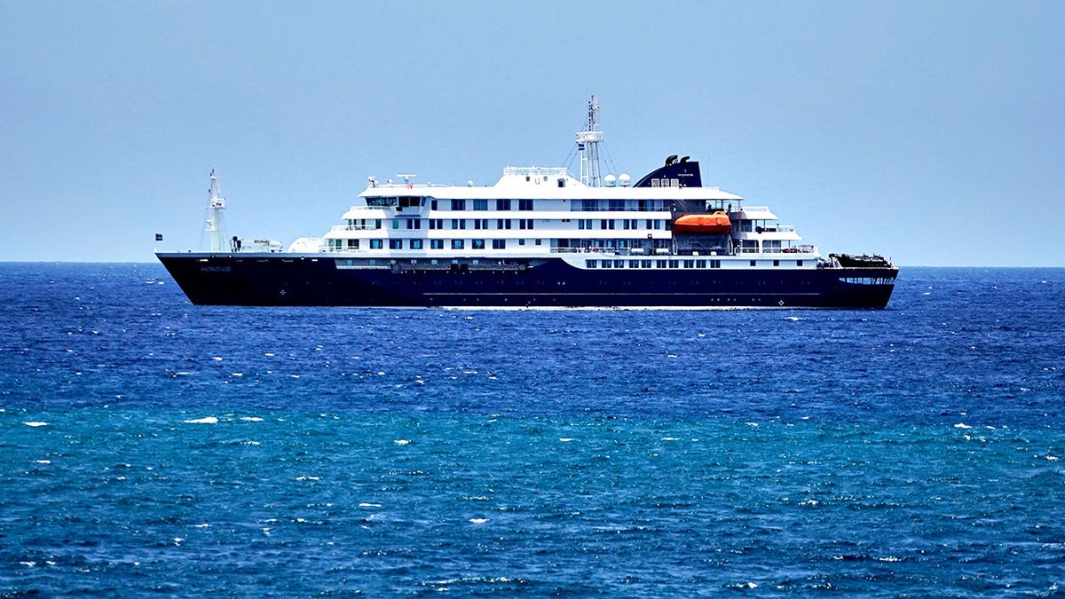 The MV Hondius cruise ship anchored at a port in Praia, Cape Verde.