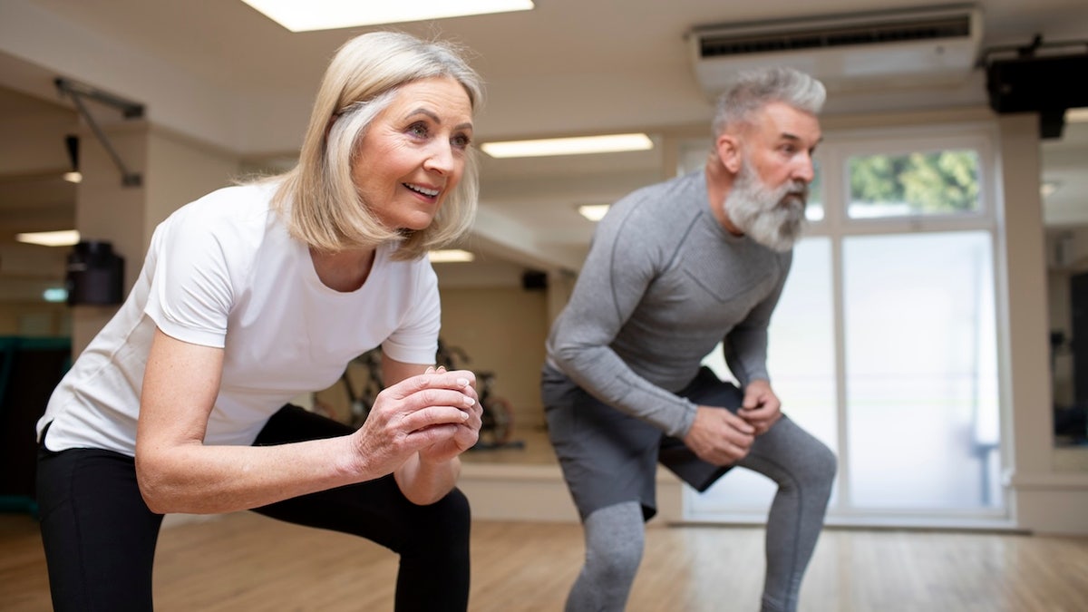 Older couple working out together