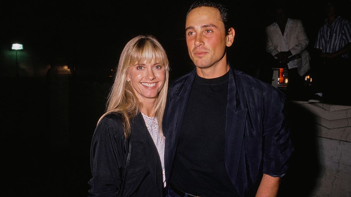 Olivia Newton-John and Matt Lattanzi attending a theater event in Los Angeles