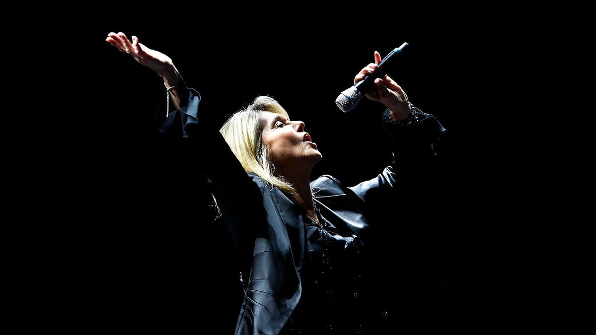 British-Australian singer Olivia Newton-John performing on stage at Vina del Mar International Song Festival
