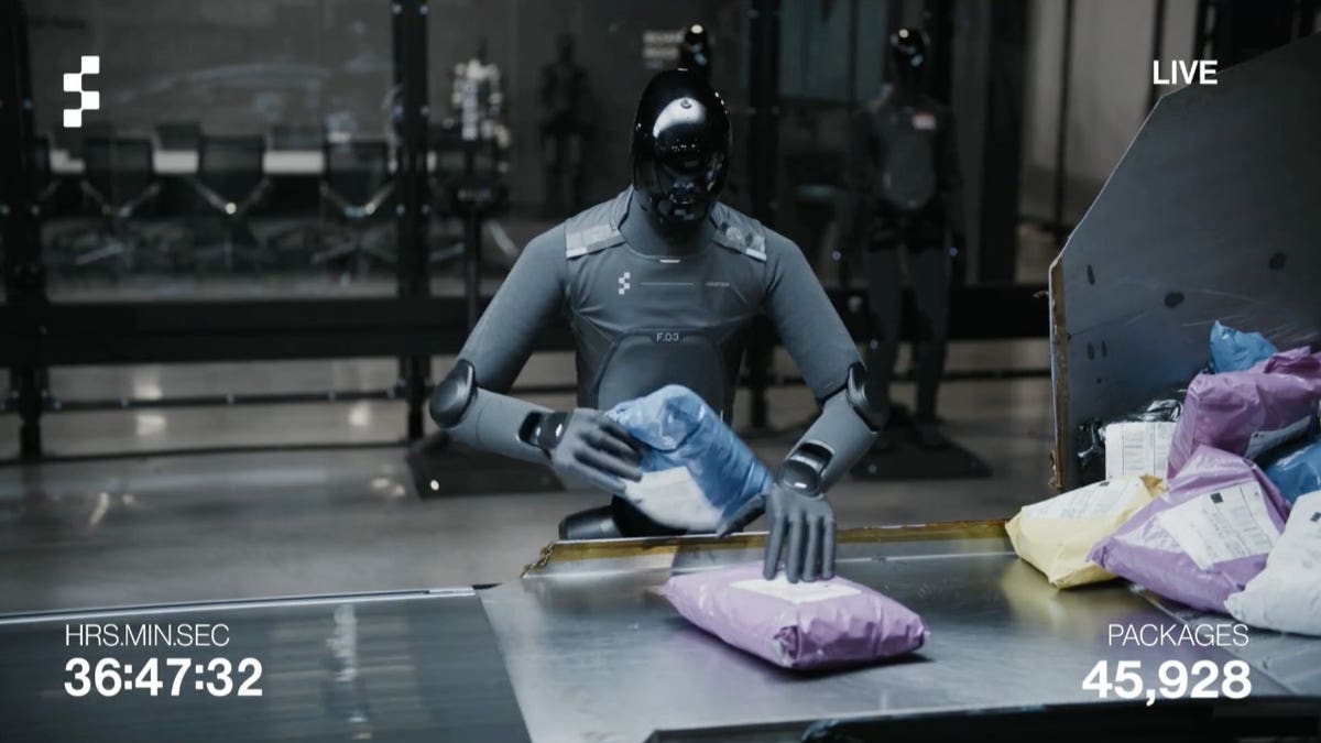 A humanoid robot handling a package