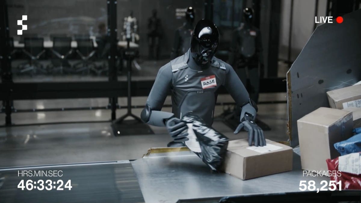A humanoid robot handling a package
