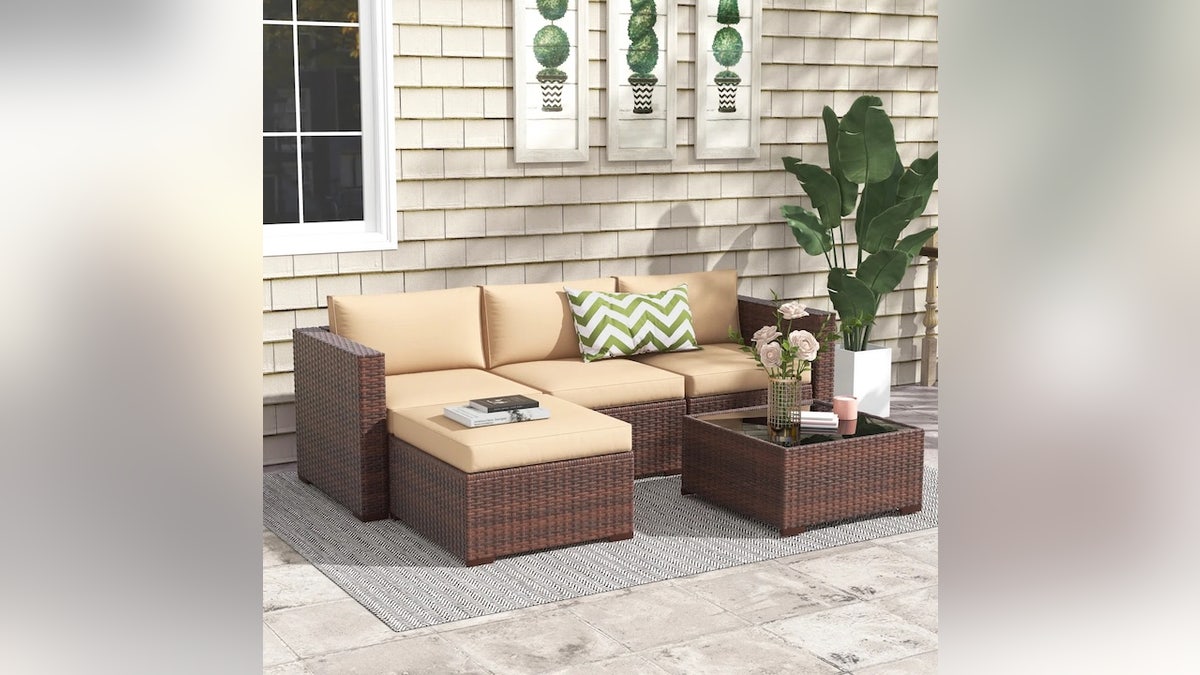 Turn this outdoor sofa into a sectional with the movable ottoman.