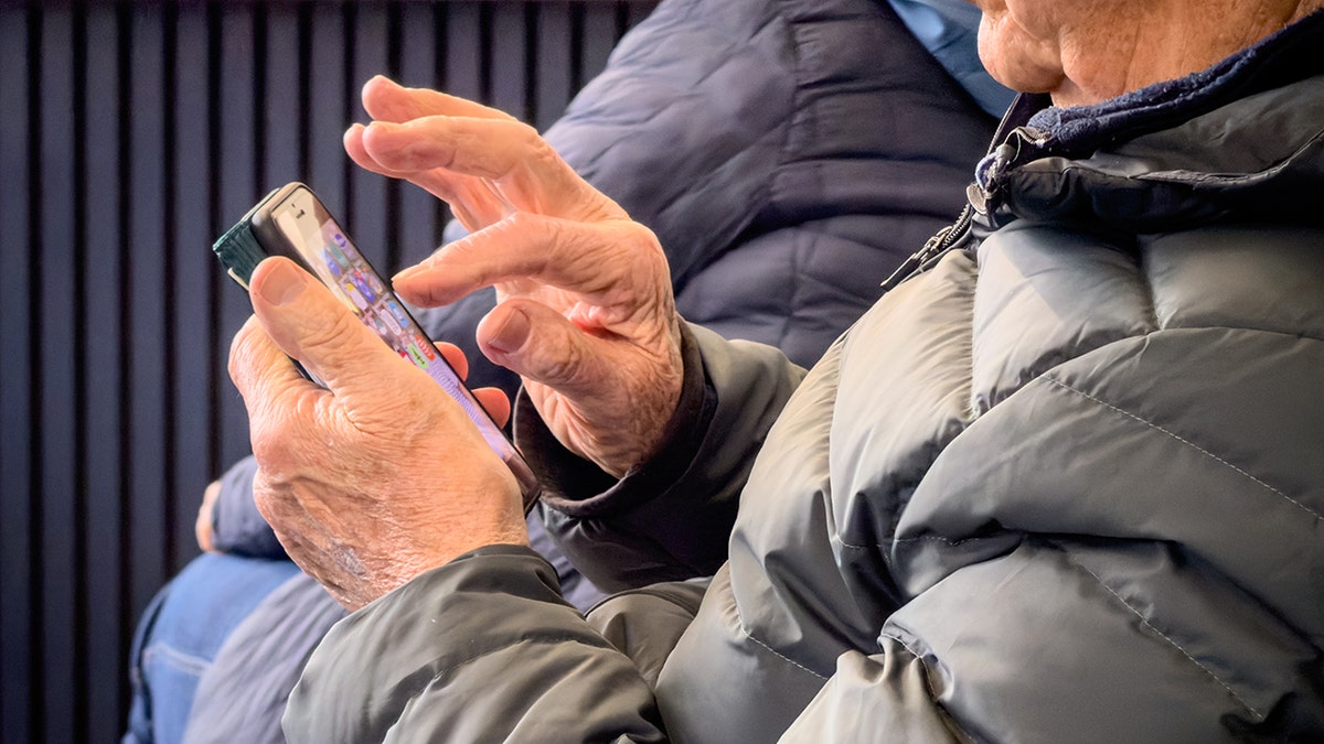 Person looking at their phoen.