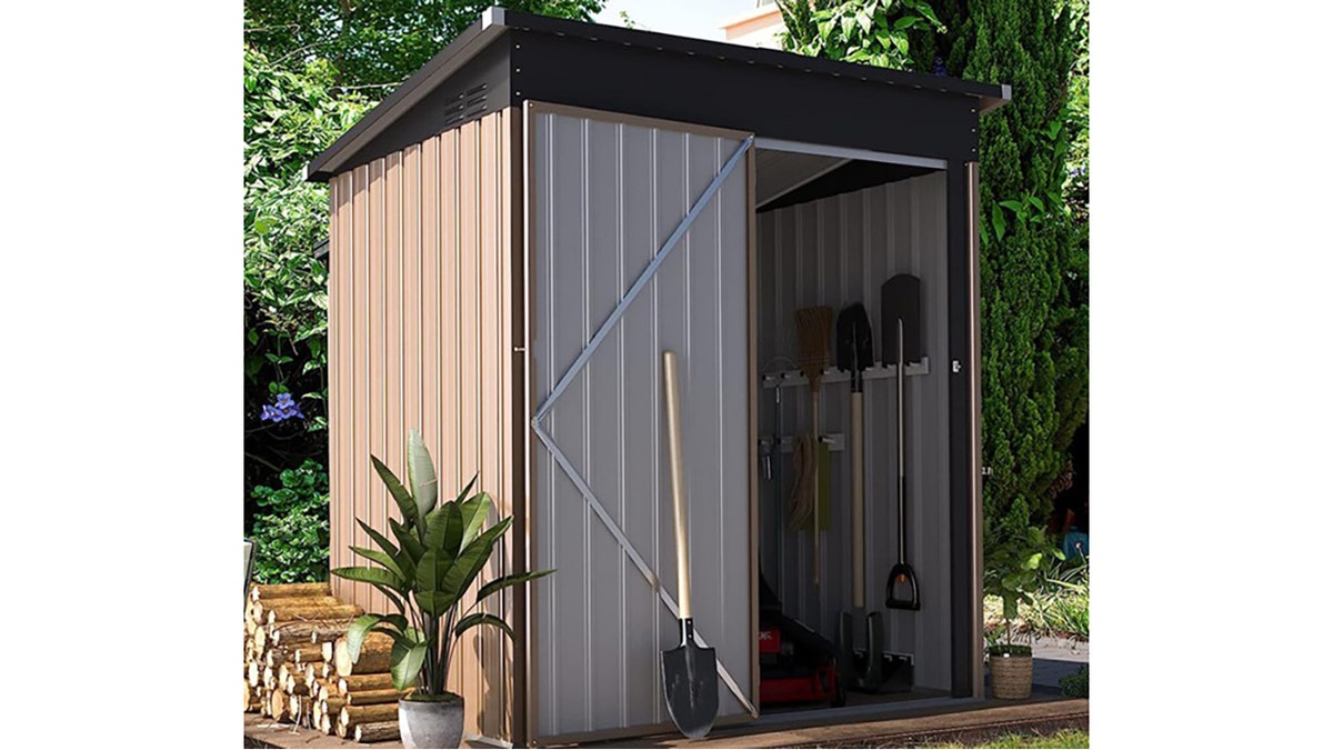 This rugged shed holds shovels, a mower and other gardening must-haves.