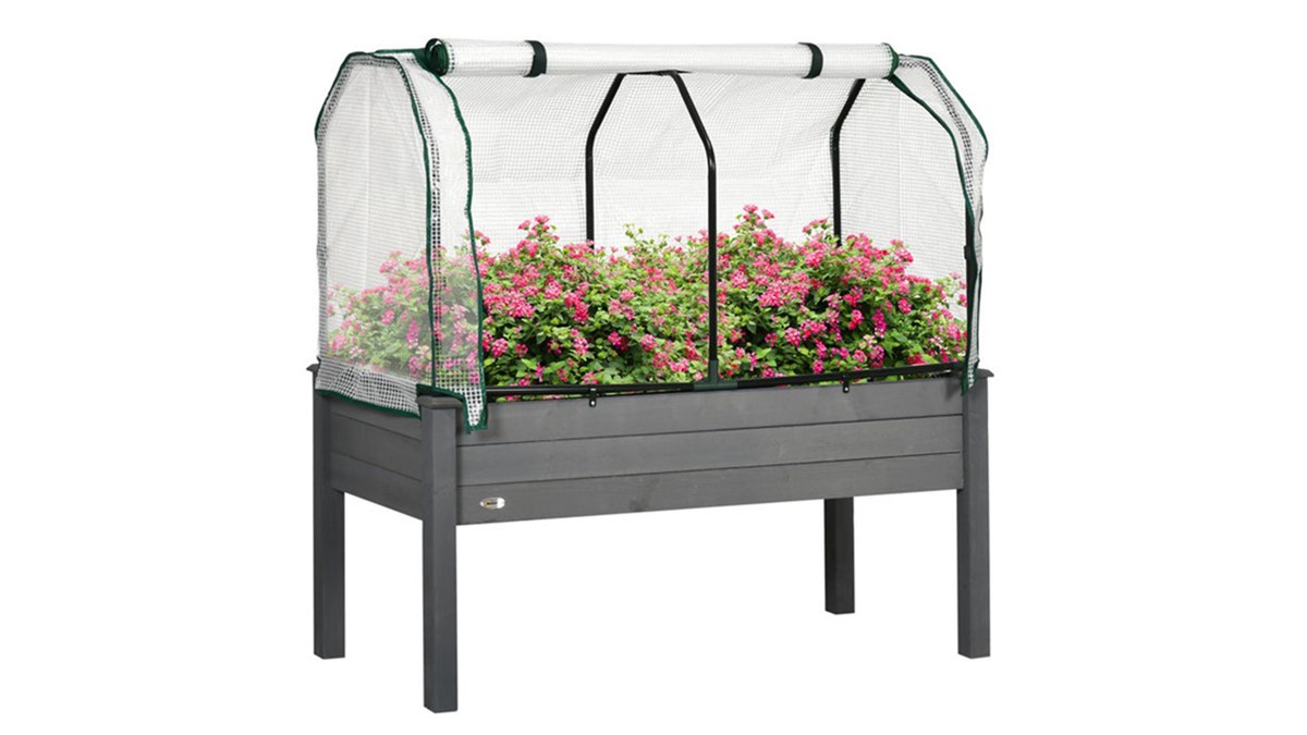 This raised bed acts as a mini greenhouse.