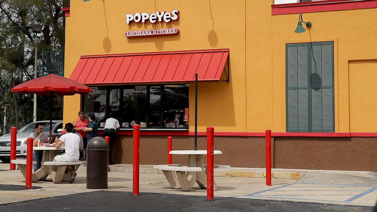 Popeyes restaurant building with signage in Miami Florida