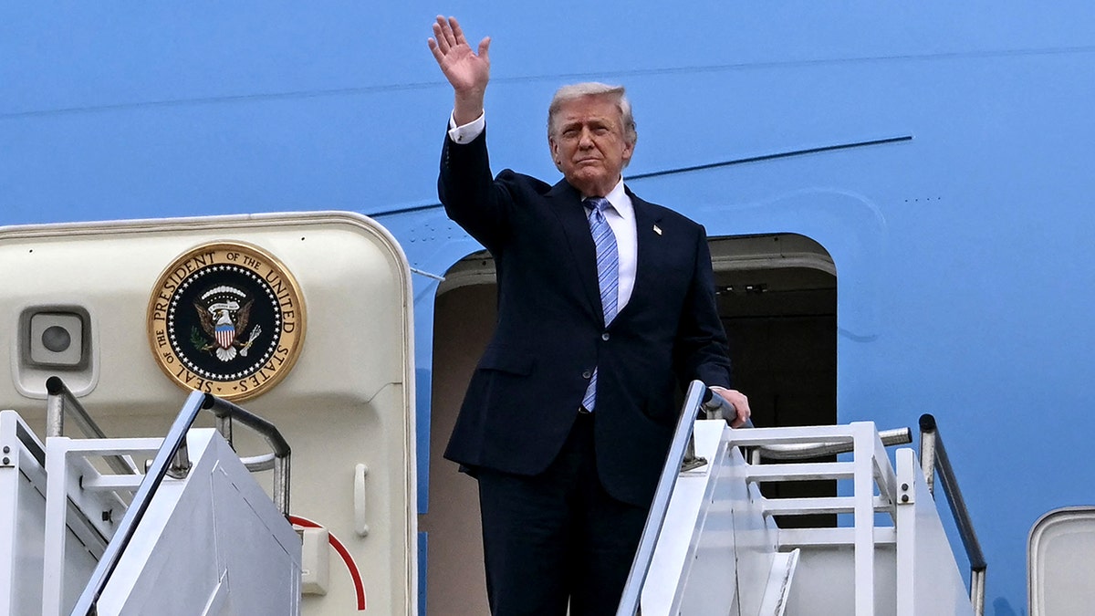 President Donald Trump waves on Air Force 1.
