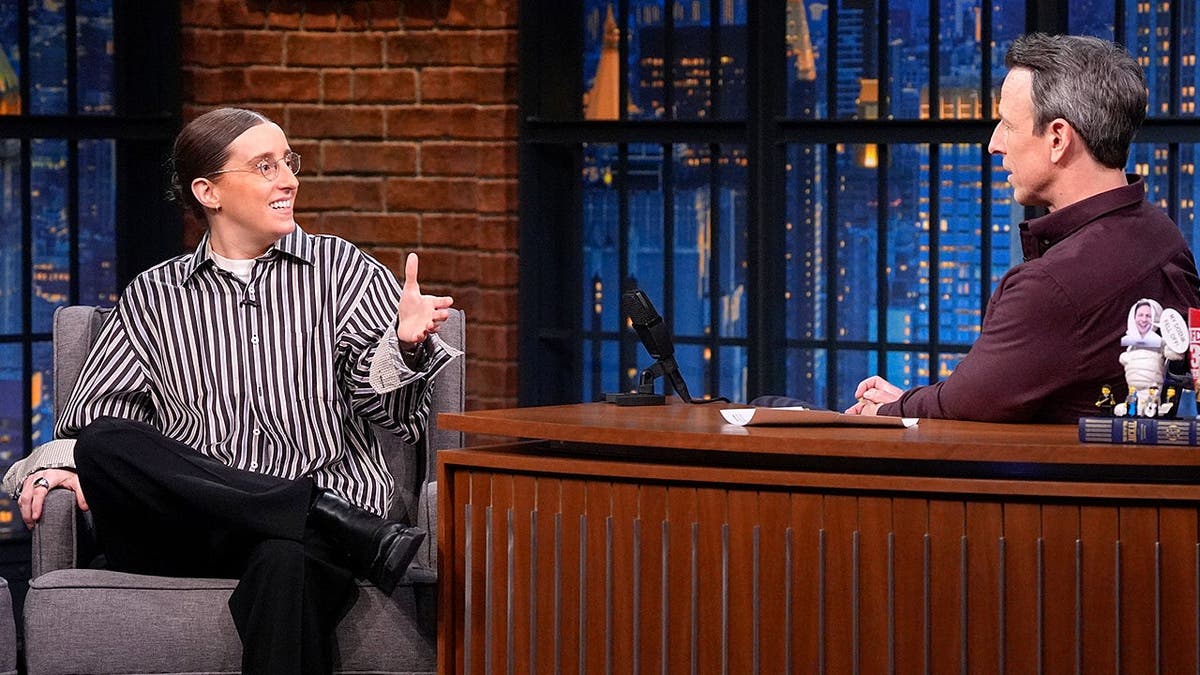 Robby Hoffman speaks with Seth Meyers during late-night interview.