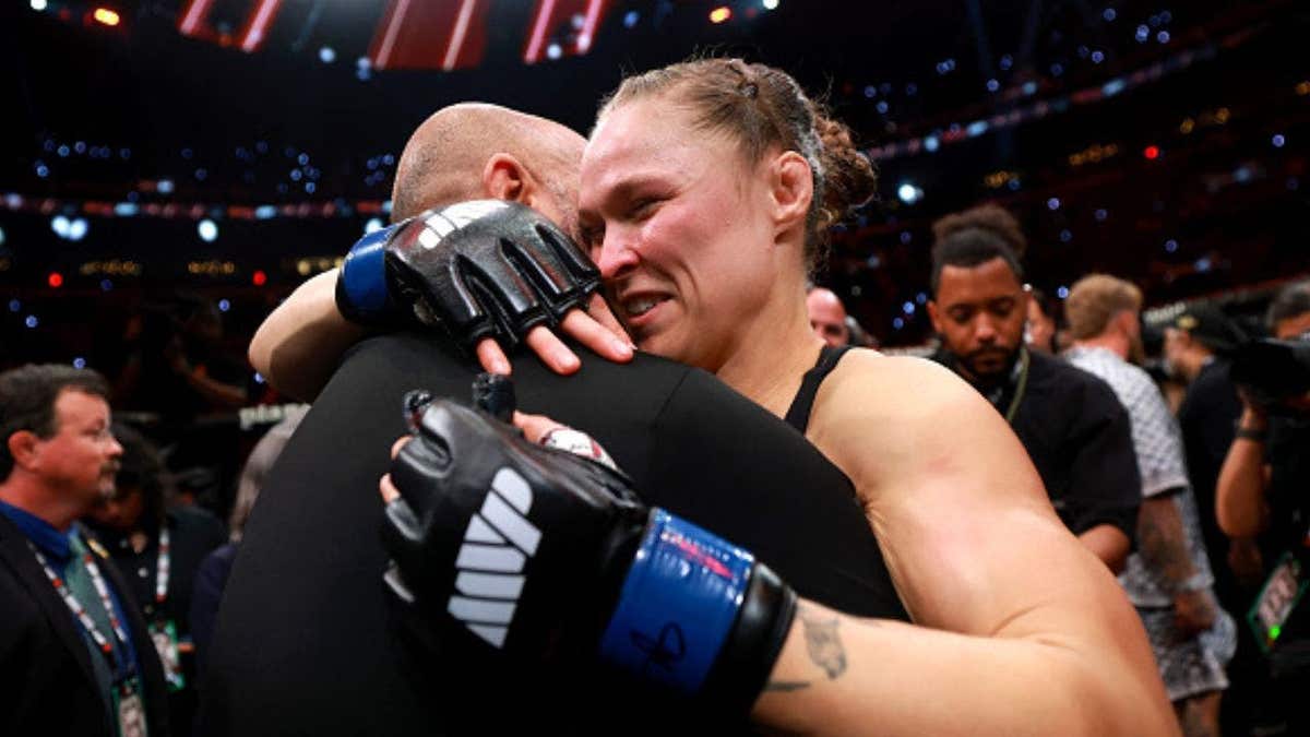 Ronda Rousey and husband Travis Browne embrace