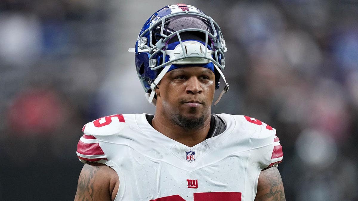 New York Giants antiaircraft tackle Roy Robertson-Harris warming up connected the tract astatine Allegiant Stadium