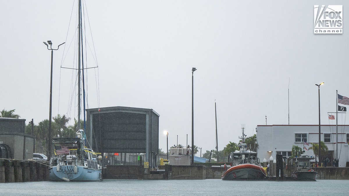 The sailing vessel Soulmate moored at a dock at the U.S. Coast Guard station in Fort Pierce.