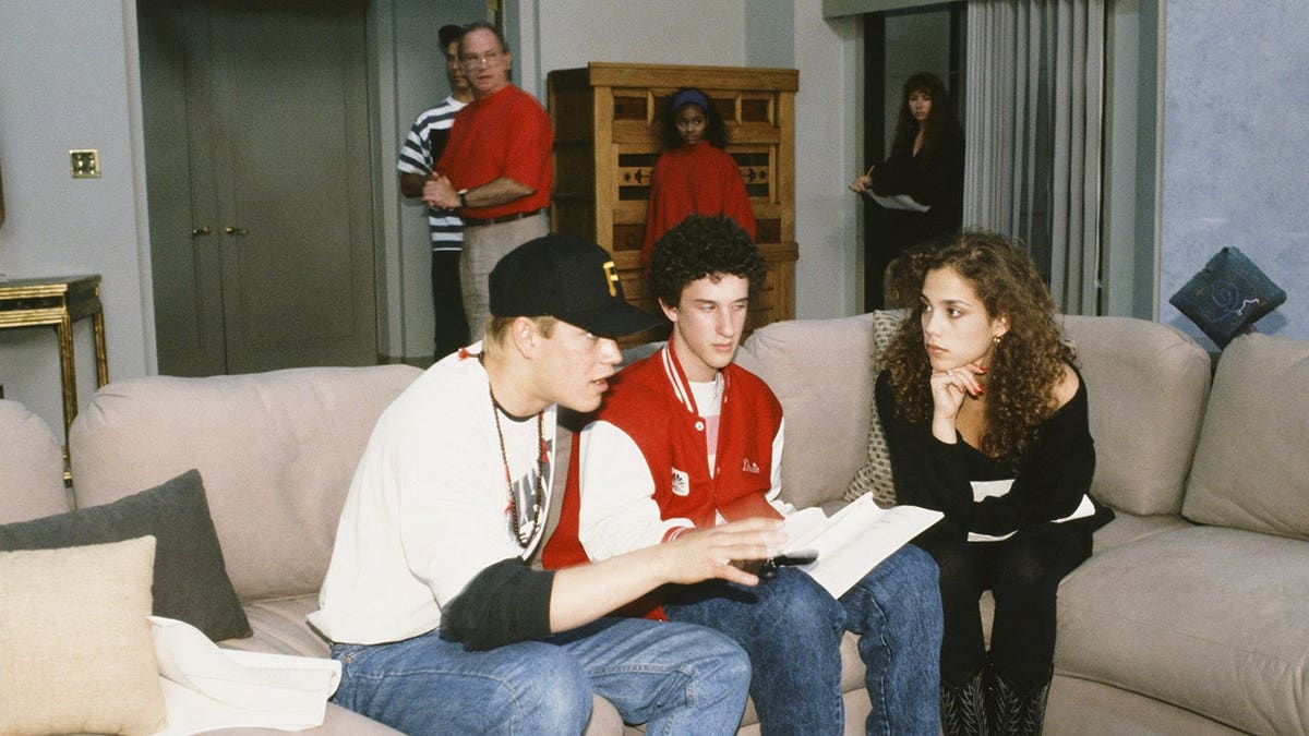Mark-Paul Gosselaar as Zack Morris, Dustin Diamond as Screech Powers, Elizabeth Berkley as Jessie Spano at table read