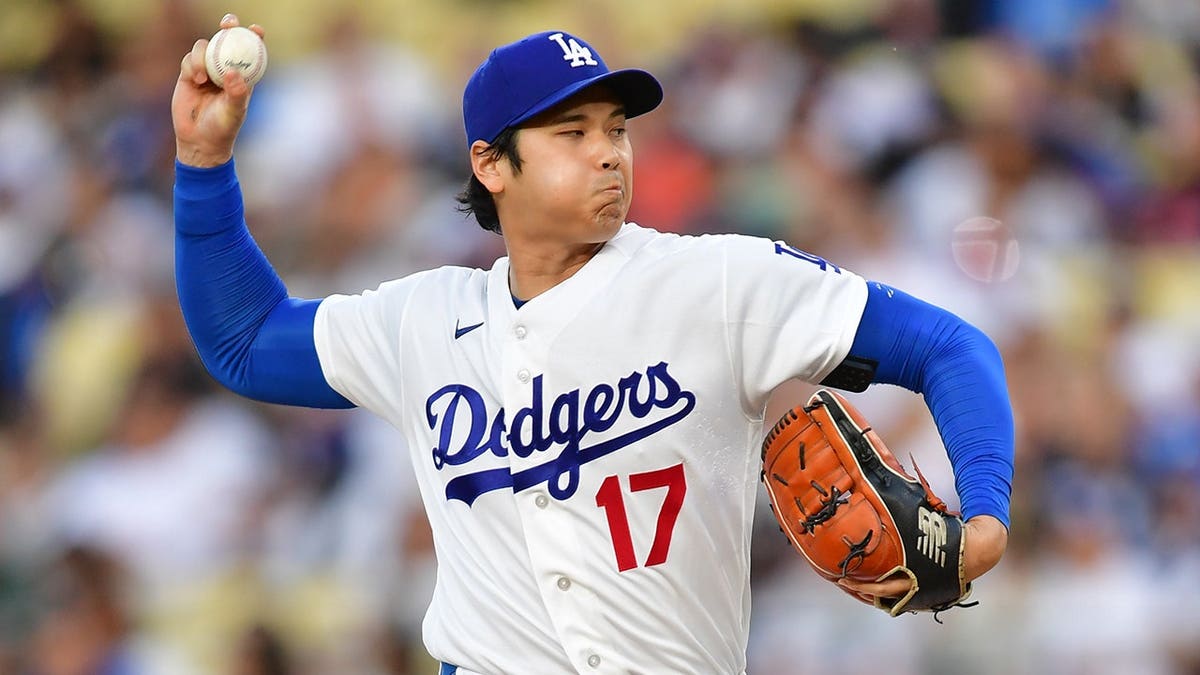 Shohei Ohtani pitches during a baseball game at Dodger Stadium