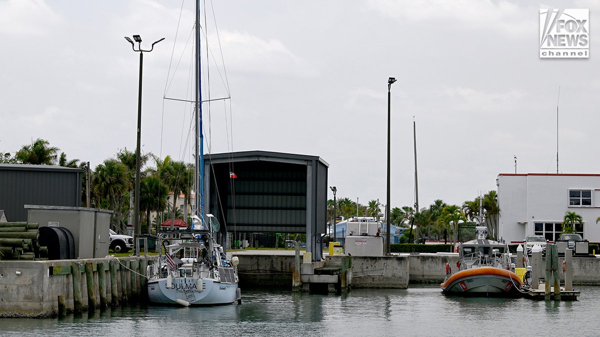 The yacht Soulmate moored at a U.S. Coast Guard station dock.