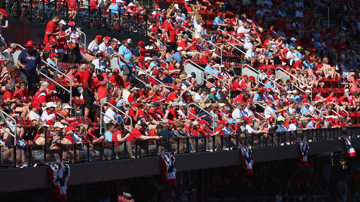 Fans cheering during player introductions at Busch Stadium in St. Louis