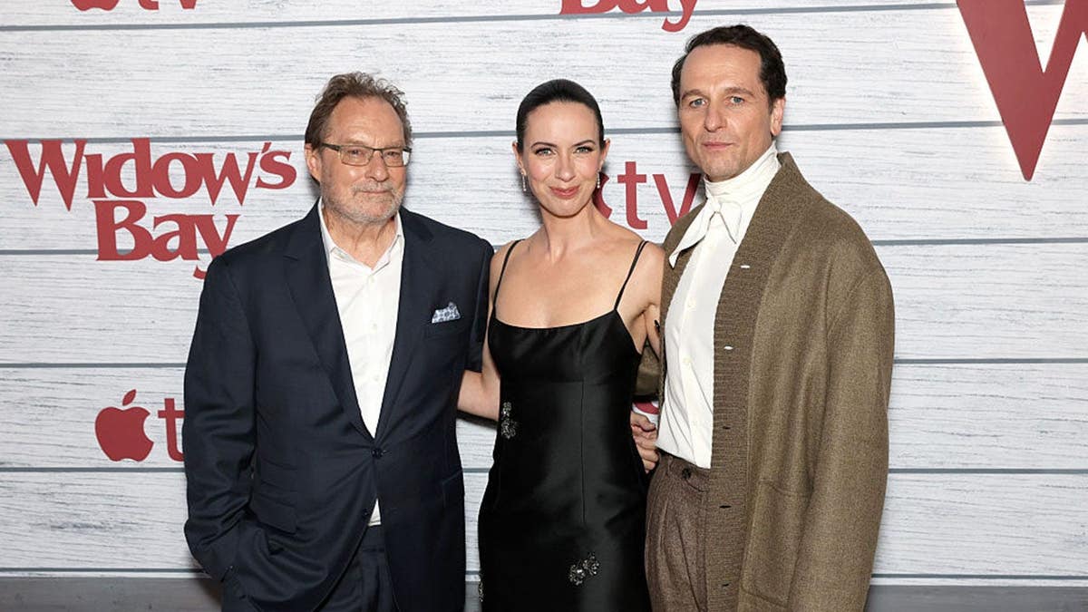 Stephen Root, Kate O'Flynn and Matthew Rhys standing together at a premiere event.