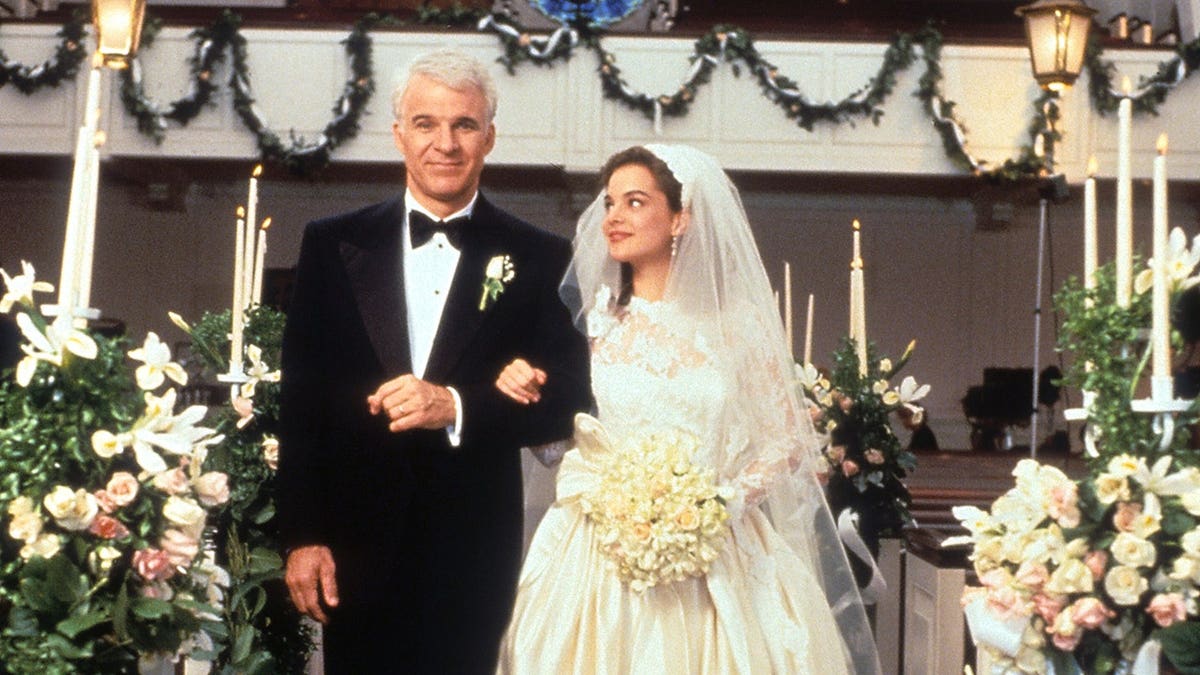 Steve Martin walking down aisle with Kimberly Williams-Paisley in film scene