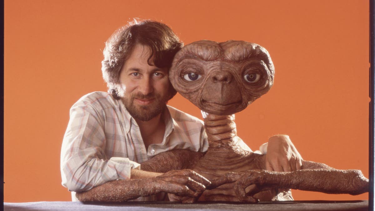 Director Steven Spielberg posing with E.T. at Carlo Rimbaldi studio